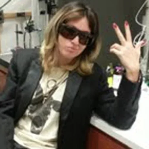 Erica Arroyo wearing sunglasses in lab.