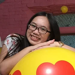 Cindy Chen with heart balloon.